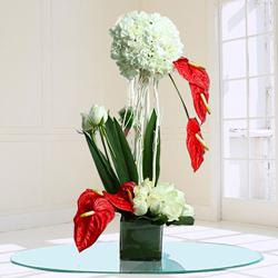 Remarkable Assorted Flowers Arrangement in Glass Vase to Palani