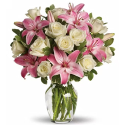 Beautiful Arrangement of Pink Lilies & White Roses in a Glass Vase
 to Rajamundri