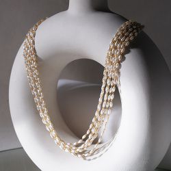 Multi Layered Pearl Charm Necklace to Muvattupuzha