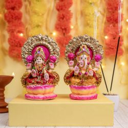 Elegant Clay Ganesh n Laxmi Pair to Irinjalakuda