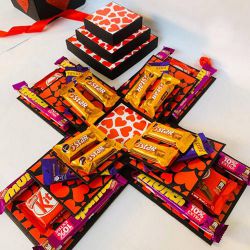 Attractive Nestle and Cadbury Chocolate Explosion Box to Kanjikode