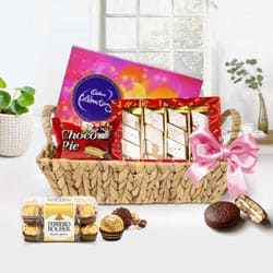 Delicious Gift of Chocolates Loaded in Basket Hamper to Kanjikode