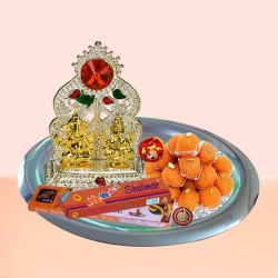 Exquisite Ganesh Lakshmi Idols with Silver Plated Thali and Pure Ghee Ladoo to Kanjikode