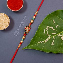 Beautifying Meenakari Mayur Rakhi