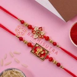 Elegant Ganesh N Floral Rakhi Set to Rakhi-to-world-wide.asp